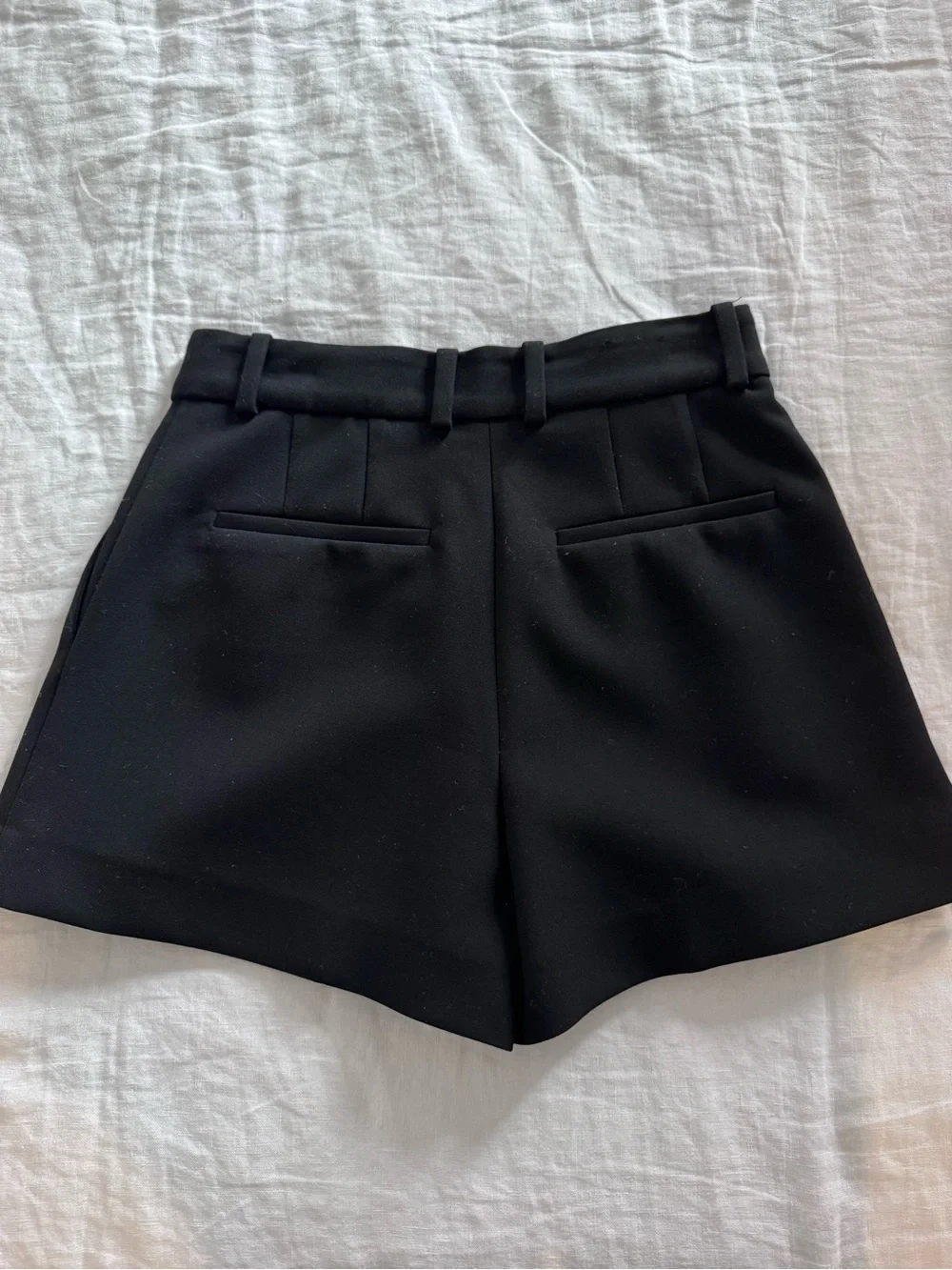 Aritzia Babaton Black Pleated Mini Shorts